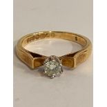 18 carat Yellow GOLD and DIAMOND SOLITAIRE RING. Having a clear 0.15 carat sparkling White Diamond