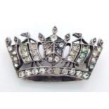 A vintage stone set silver crown brooch. Total weight 4.35G.