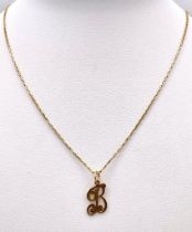 A 9K GOLD INITIAL "B" PENDANT ON A 40cms DISAPPEARING NECKLACE . 3gms