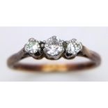 A 18K YELLOW GOLD & PLATINUM 3 STONE 0.25CT DIAMOND RING. TOTAL WEIGHT 2.3G. SIZE N