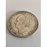 1929 DUTCH SILVER 2.5 GUILDER COIN in very fine condition. A little dirty,could use a clean.