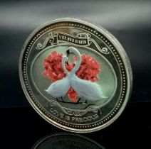 1 0Z OFF 999 FINE SILVER COIN WITH LOVE BIRDS ON AND THE WORDS LOVE IS PRECIOUS. TOTAL WEIGHT 31.3G