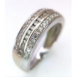 An 18K White Gold Diamond Three Row Half Eternity Ring. 0.34ctw of diamonds. Size L. 3.5g total