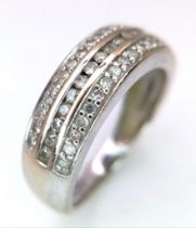 An 18K White Gold Diamond Three Row Half Eternity Ring. 0.34ctw of diamonds. Size L. 3.5g total
