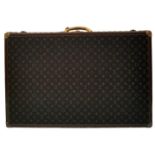 A Louis Vuitton Alzer 80 Monogram Large Sturdy Suitcase/Trunk. Monogram canvas and brown leather