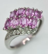 A 9K White Gold Pink Topaz and Diamond Ring. Size J/K. 2.45g weight.