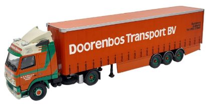 A Limited Edition Die Cast Corgi Volvo Truck and Curtainside Trailer. As new, in box. Scale - 1:50.
