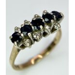 A Classic Vintage Sapphire and Diamond Ring. Five sapphires between four two rows of diamonds.
