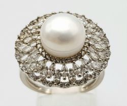 Art Deco Design Silver Pearl & Clear Stone Set Ring Size O. Crown measures 2.1cm Diameter.