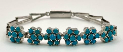 A Turquoise Floral Silver Bracelet. Turquoise-6ctw. W-14g. 21cm length. Ref: HV-2010