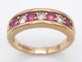 A 9K YELLOW GOLD 0.15CT DIAMOND & RUBY RING. TTOAL WEIGHT 2.3G. SIZE H