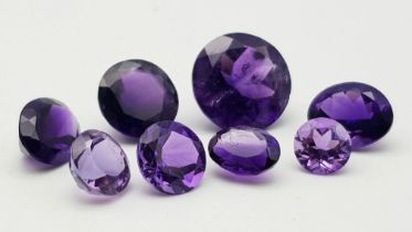 A Parcel of 8 Amethysts, Top Colour, Assorted Sizes up to 14mm Diameter. 27.94 Carats Total