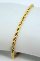 An Italian 9K Yellow Gold Rope Bracelet. 17cm. 1.44g weight.