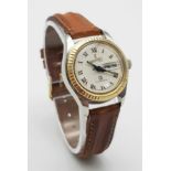 AN EBERHARD&CO LADIES WATCH WITH 14K GOLD BEZEL , AUTOMATIC MOVEMENT , ROMAN NUMERALS AND BROWN