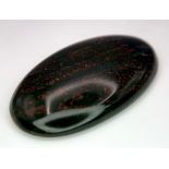 A classic example of a large BLOOSTONE cabochon, weight: 48.8 carats, dimensions: 40 x 24 x 6 mm.