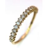 An 18K Yellow Gold Diamond Half Eternity Ring. Size N. 1.32g total weight.