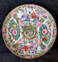 An Antique Chinese Hand Painted Bowl. Courtyard and floral decoration throughout with gilded