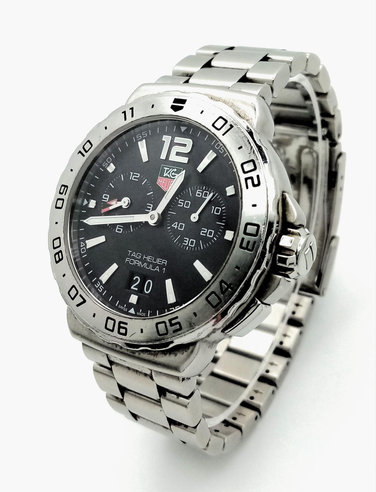 A Tag Heuer Formula 1 Gents Alarm Watch. Stainless steel bracelet and case - 42mm. Black dial with