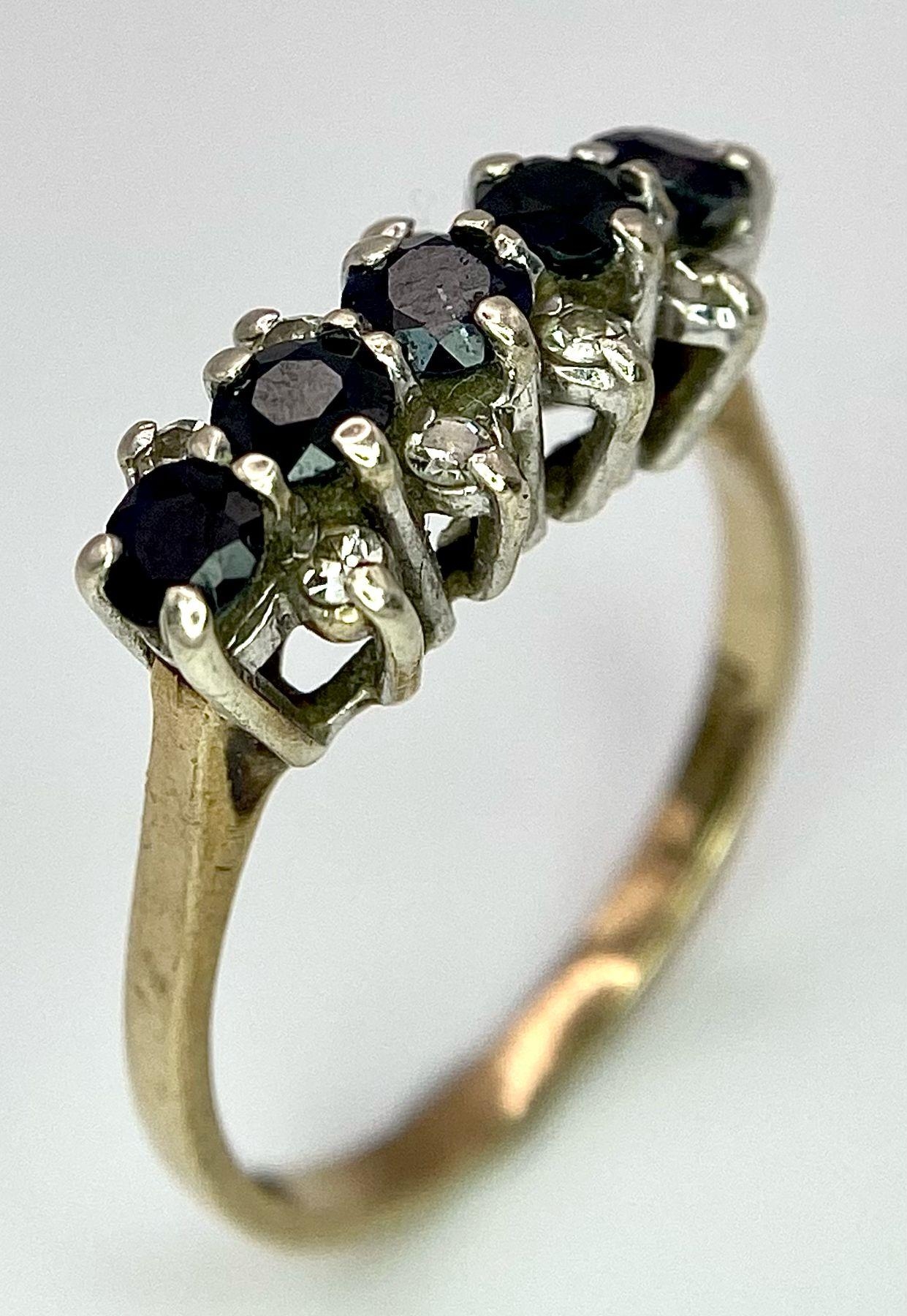 A Classic Vintage Sapphire and Diamond Ring. Five sapphires between four two rows of diamonds. - Image 2 of 7