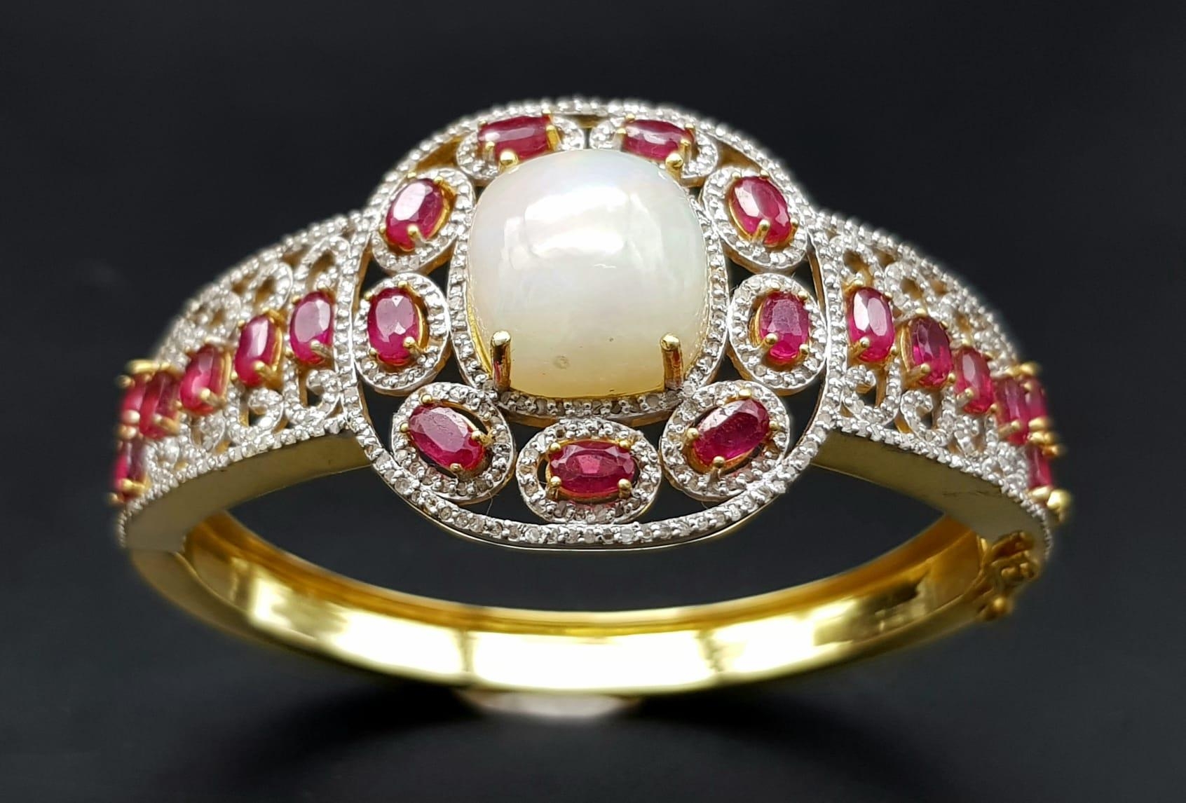 A Wonderful Majestic Colour-Play 12ct Opal and Ruby Gemstone Cuff Bracelet with Diamond Accents. - Image 2 of 6