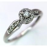 A 9K WHITE GOLD 0.10CT DIAMOND RING. TOTAL WEIGHT 1.8G. SIZE M