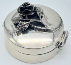 A Vintage Sterling Silver Trinket Box with Ornate Rose Decoration. 25mm diameter.