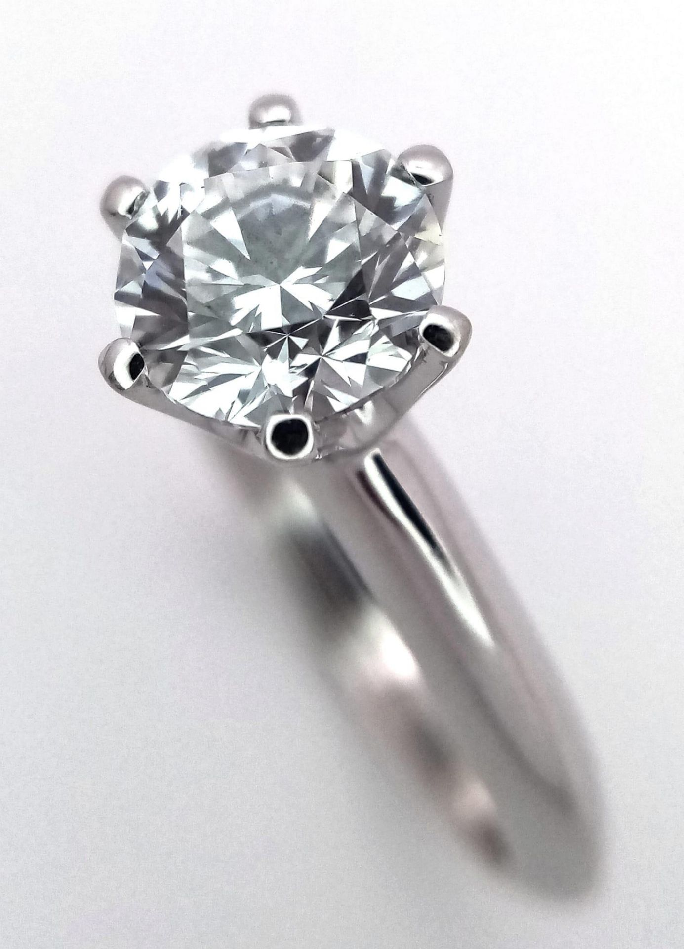 An 18K white Gold 1ct Diamond Solitaire Ring. Brilliant round cut diamond. Comes with an IGI - Image 4 of 9