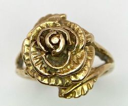 A Vintage 9K Yellow Gold Floral Ring. A decorative ornate central rose. Size L. 5.3g weight.
