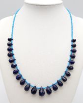 A 113ct Blue Sapphire Tear Drop Necklace with Blue Turquoise Beads. 42cm length. Ref: CD-1139
