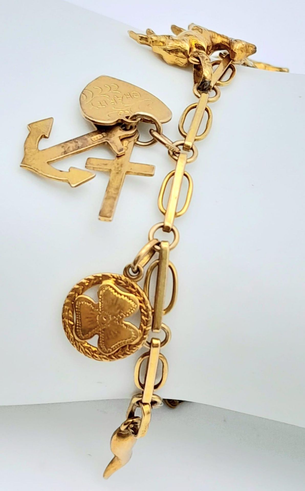 A 9K Yellow Gold Charm Bracelet. Eight charms including Elephant! 10.65g weight. - Image 5 of 6