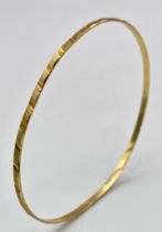 A 9K yellow Gold Thin Bangle. 3mm width. 6cm inner diameter. 3.67g weight.