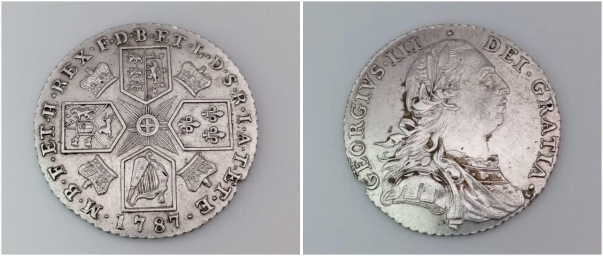A George III 1787 Silver Shilling. Please see photos for conditions.