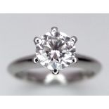 An 18K white Gold 1ct Diamond Solitaire Ring. Brilliant round cut diamond. Comes with an IGI