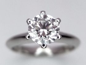 An 18K white Gold 1ct Diamond Solitaire Ring. Brilliant round cut diamond. Comes with an IGI