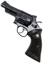 A Smith and Wesson .45 Calibre Revolver. This USA made pistol has a 4 inch barrel with a nice dark