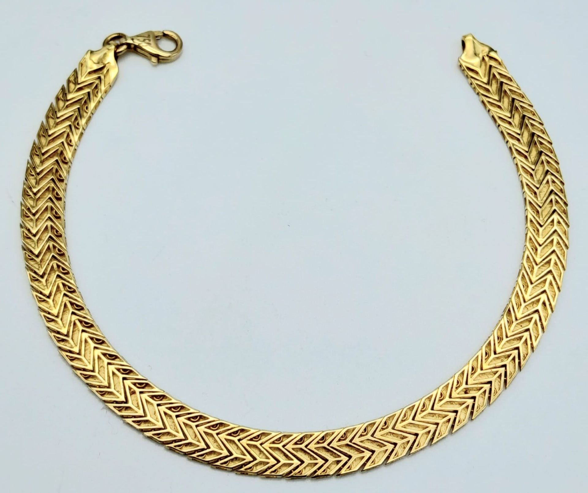 An 18K Yellow Gold Flat Scale Link Bracelet. 18cm length. 8.2g weight. - Image 4 of 4