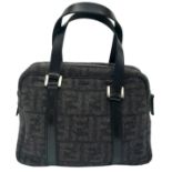 A Fendi Black and Charcoal Grey Bag. Textile exterior with black leather handles, silver-toned