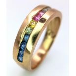 A 9K Yellow Gold Multi-Gemstone Band Ring. Includes sapphires and diamonds. Size L. 3.05g weight.