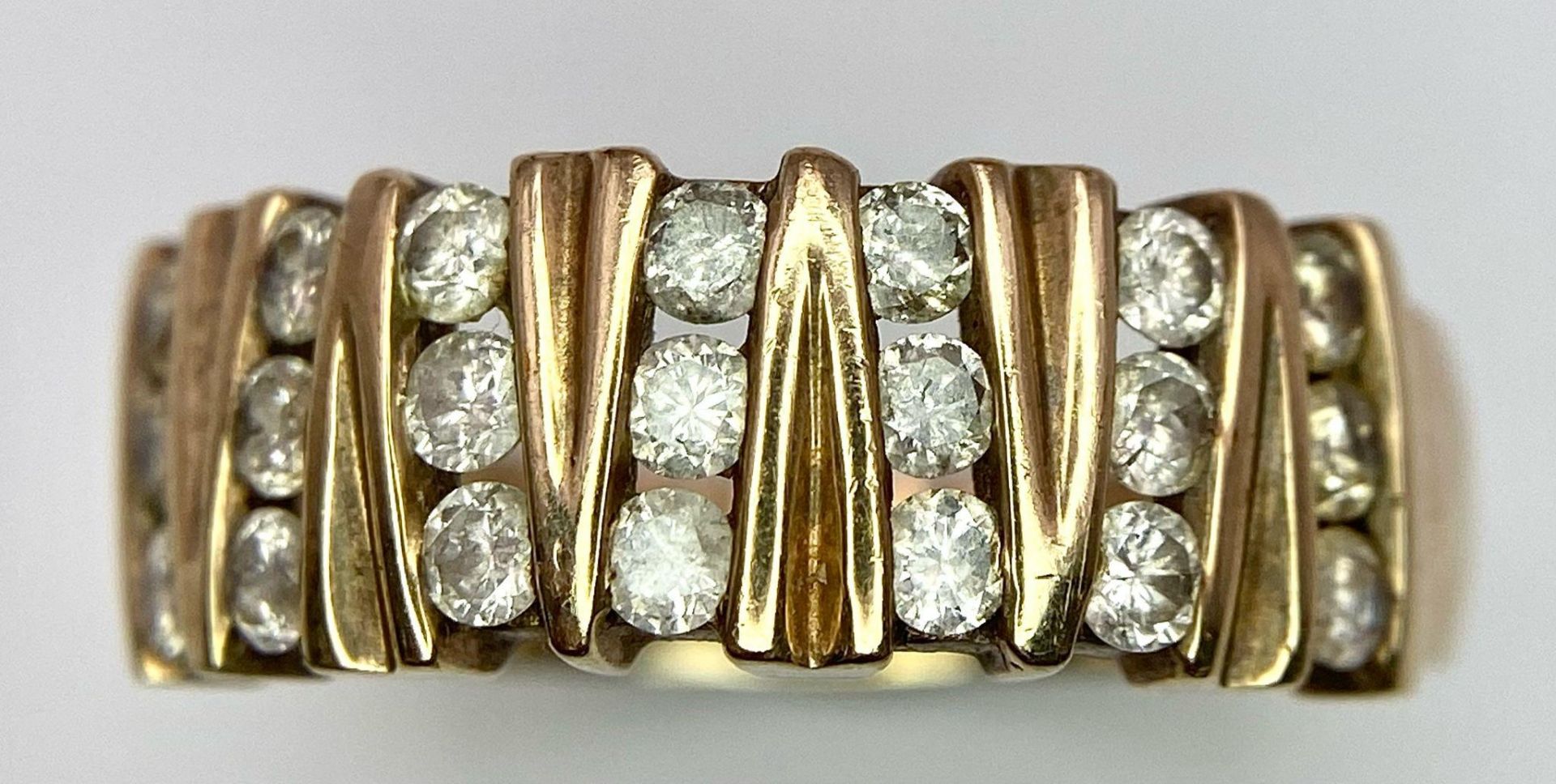 A Vintage 9K Yellow Gold 21 Diamond Ring. 1ctw of brilliant round cut diamonds. Size T. 5.9g total - Image 2 of 7