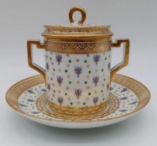 AN 18TH CENTURY FRENCH LIDDED CUP WITH SAUCER ORNATELY DECORATED ..