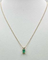An 18K Yellow Gold Emerald Pendant on an 18K Gold Disappearing Necklace. 10mm and 40cm. 1.35g