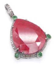 A 21ct Ruby Gemstone Pendant with 0.60ctw of Diamond and 0.50ctw Emerald accents. Set in 925 Silver.