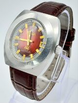 A Vintage Ricoh 17 Jewel Automatic Gents Watch. Dark auburn leather strap. Stainless steel case -