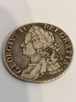 1758 GEORGE II SILVER SHILLING. Small scratch to shield otherwise very fine condition. Please see