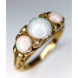 A Wonderful Vintage 9K Yellow Gold and Three Opal Ring. Excellent colour-play. Size I. 3.25g weight.