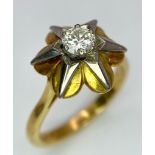 A Vintage 18k Yellow Gold Diamond Solitaire Ring. Central 0.65ct brilliant round cut diamond in a