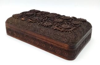 A lovely vintage intricately hand carved Kashmiri wooden box. The fantastic carving which covers