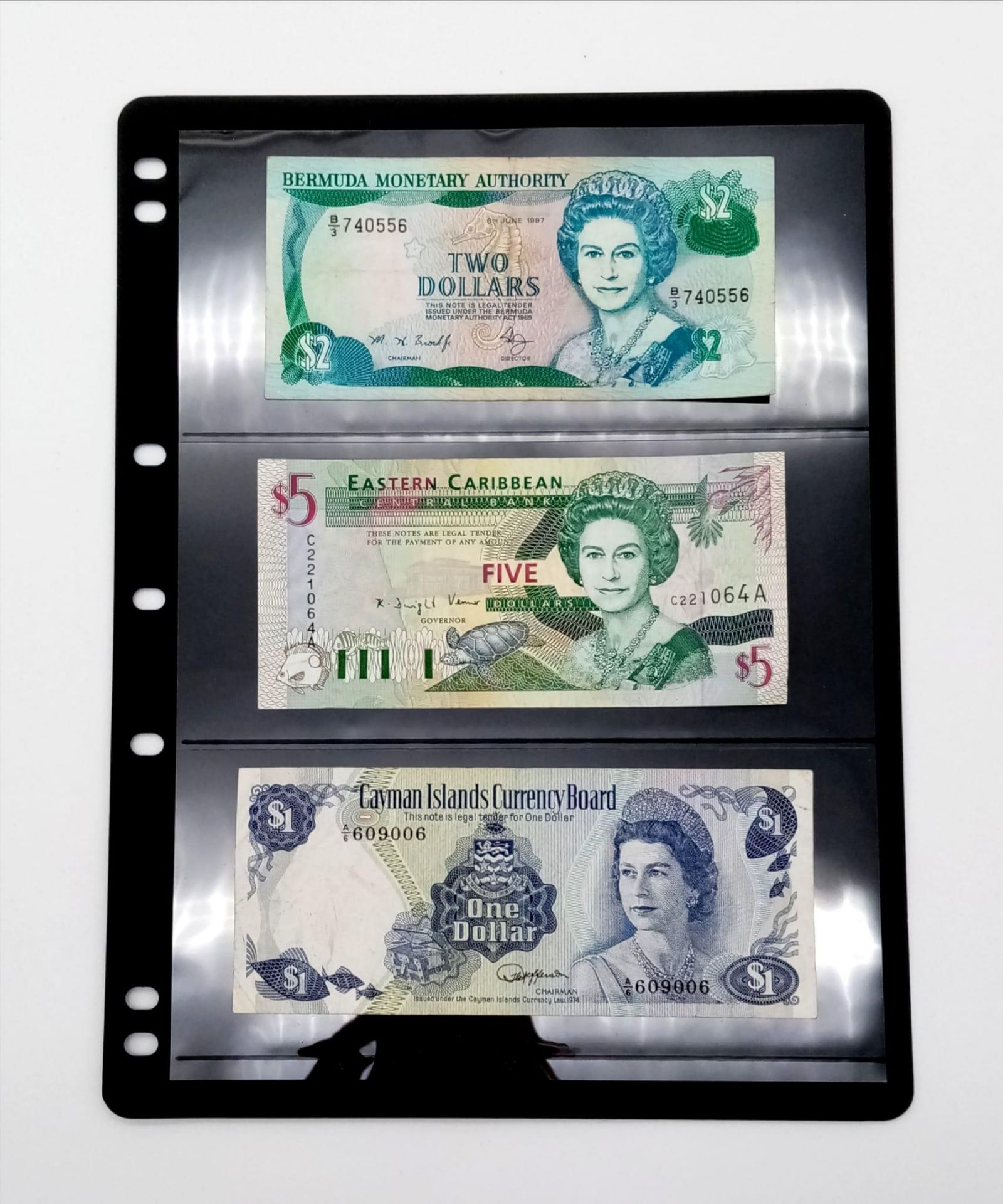 Three Vintage Caribbean Currency Notes - Including a very collectable 1974 Cayman Islands one dollar