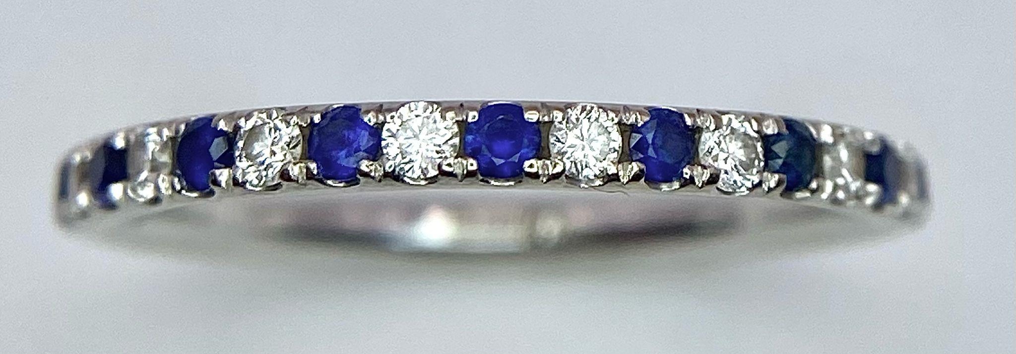 A 14ct white gold diamond and sapphire full eternity ring set with 18 diamonds and 18 sapphires, 1. - Image 2 of 5