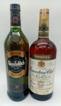 Two Large Bottles of Famous Brand Whisky: A one litre boxed bottle of 12 year old Glenfiddich and